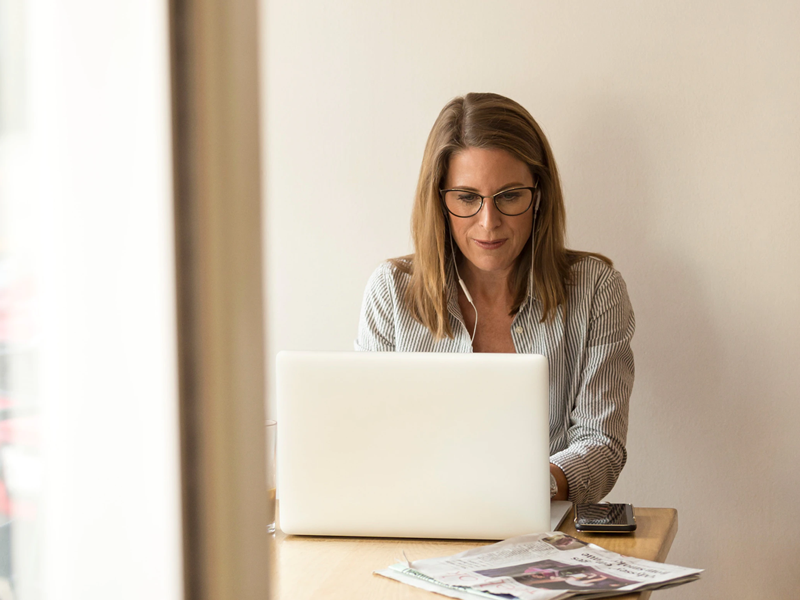 woman at laptop in a video call doing the trening stranog jezika online education